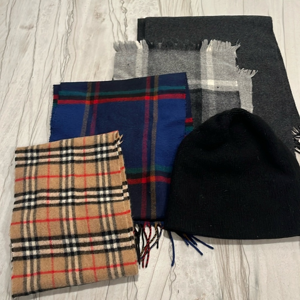 Four wool scarves and a black wool hat